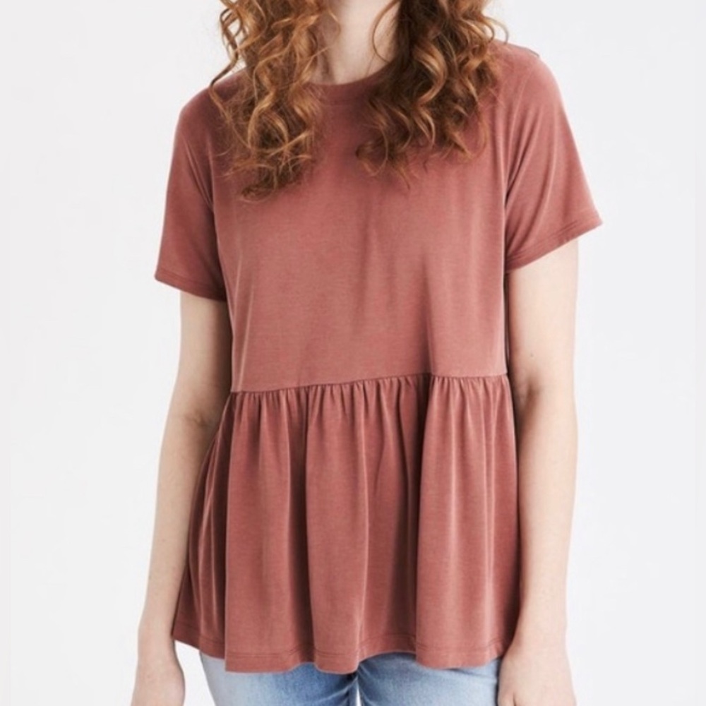 This shirt fits more like a small. Wore 2-3 times.